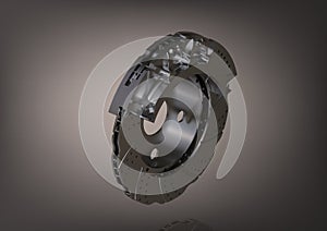 Silver brake disc on a gray
