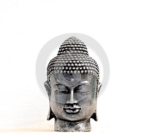 Silver Buddha head with white background