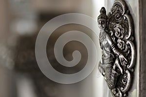 Silver buddhism sculpture