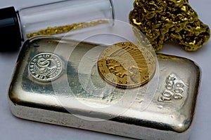 Silver Bullion Bar, Gold Coin and Gold Nuggets