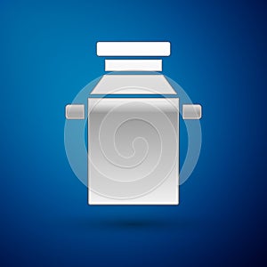 Silver Can container for milk icon isolated on blue background. Vector