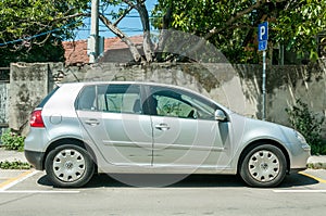 Silver car Volkswagen VW Golf 5 2.0 TDI Diesel parked on the street