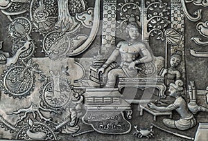 Thai style silver carving art on temple wall , Wat Srisuphan ,Chiang Mai, Thailand.