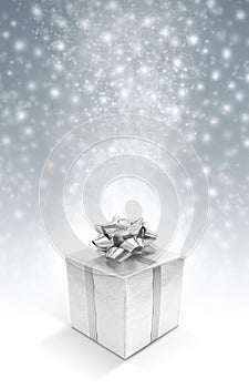 Silver celebration gift boxe on snow background photo