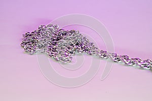 Silver chain for costume jewelry as a background image with copy space photographed