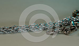 Silver chain for costume jewelry as a background image with copy space photographed