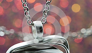 Silver chain for costume jewelry as a background image with copy space photographed