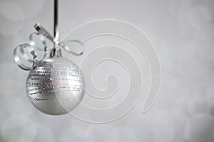 Silver Christmas ball with ribbon