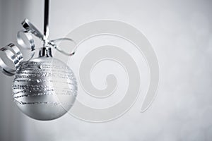 Silver Christmas ball with ribbon