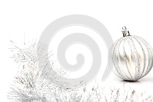 silver christmas ball on white