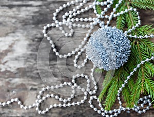 Silver Christmas ball on wooden background