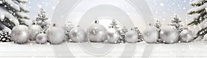 Silver Christmas balls, stars and trees in a row.