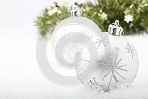 Silver Christmas baubles.