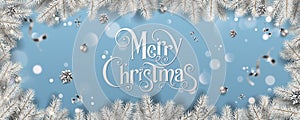 Silver Christmas and New Year Text on blue Xmas background with snowy fir branches, silver ribbon, decoration, sparkles, confetti,