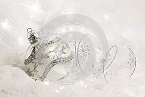 Silver Christmas Ornament in Snow