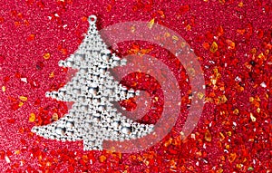 Silver Christmas tree on red background