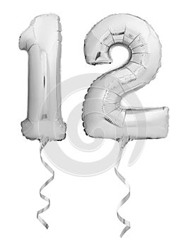 Silver chrome number 12 twelve made of inflatable balloon with ribbon on white