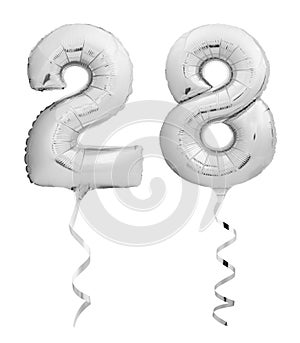 Silver chrome number 28 twenty eight made of inflatable balloon with ribbon isolated on white