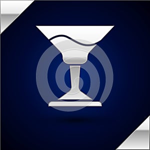 Silver Cocktail icon isolated on dark blue background. Vector