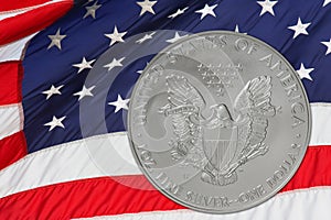 Silver Coin and USA Flag
