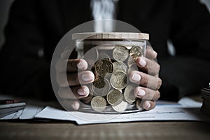 Silver coins in hands