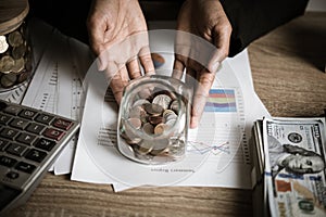 Silver coins in hands