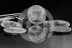 Silver Coins and Silver bar photo