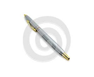 Silver color metal pen for writing is automatically isolated on a white.