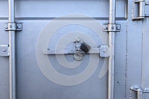 Silver colored industrial Intermodal Shipping Container Door Lock Mechanism for Security During Shipping