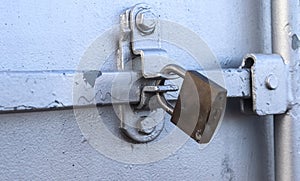 Silver colored industrial Intermodal Shipping Container Door Lock Mechanism for Security During Shipping