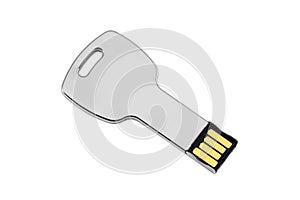 Silver colored USB-stick shaped like a key, on white photo