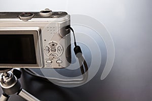 Silver compact digital photo camera.