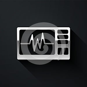 Silver Computer monitor with cardiogram icon isolated on black background. Monitoring icon. ECG monitor with heart beat