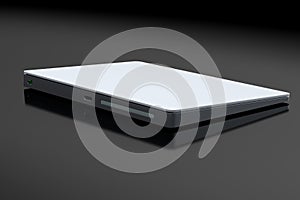 Silver computer trackpad or wireless touch pad isolated on black background photo