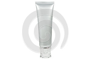 Silver cosmetic tube with transparent cap isolated and clipping path.