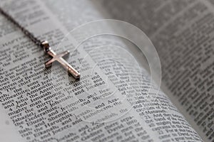 Silver cross and bible