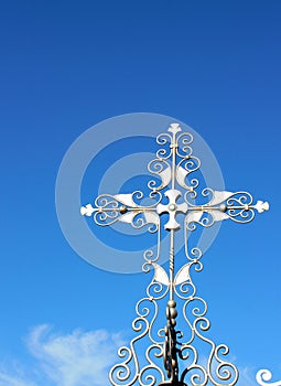 Silver cross on entrance gate of Masonic Cemetery, Canyonville, Oregon