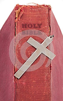 Silver Cross on Old Bible