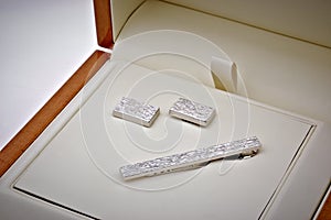 Silver cuff link and tie pin