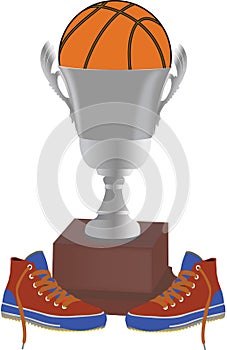 Silver cup with basketball ball inside and shoes photo