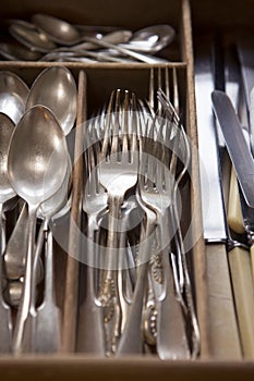 Silver Cutlery Arranged In Drawer