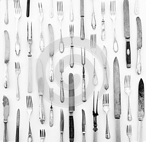 Silver cutlery - vintage knife and fork on white background , b