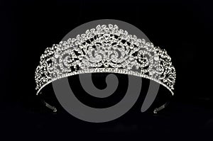 Silver diadem with diamonds isolated on black