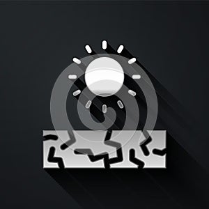 Silver Drought icon isolated on black background. Long shadow style. Vector