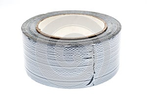 Silver duct gaffer repair tape roll isolated on white.