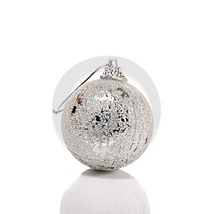 Silver dull christmas ball on white background