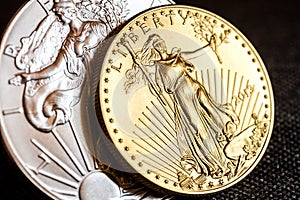Silver eagle and golden american eagle one ounce coins