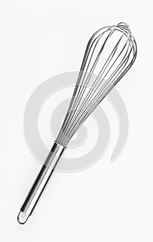 Silver eggbeater isolated on white background. Metallic kitchen tool