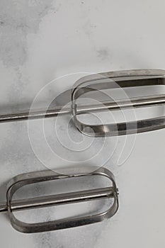 Silver Eggbeater isolated on white ground.Kitchen tool