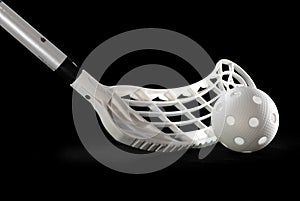 Silver floorball stick and white ball photo